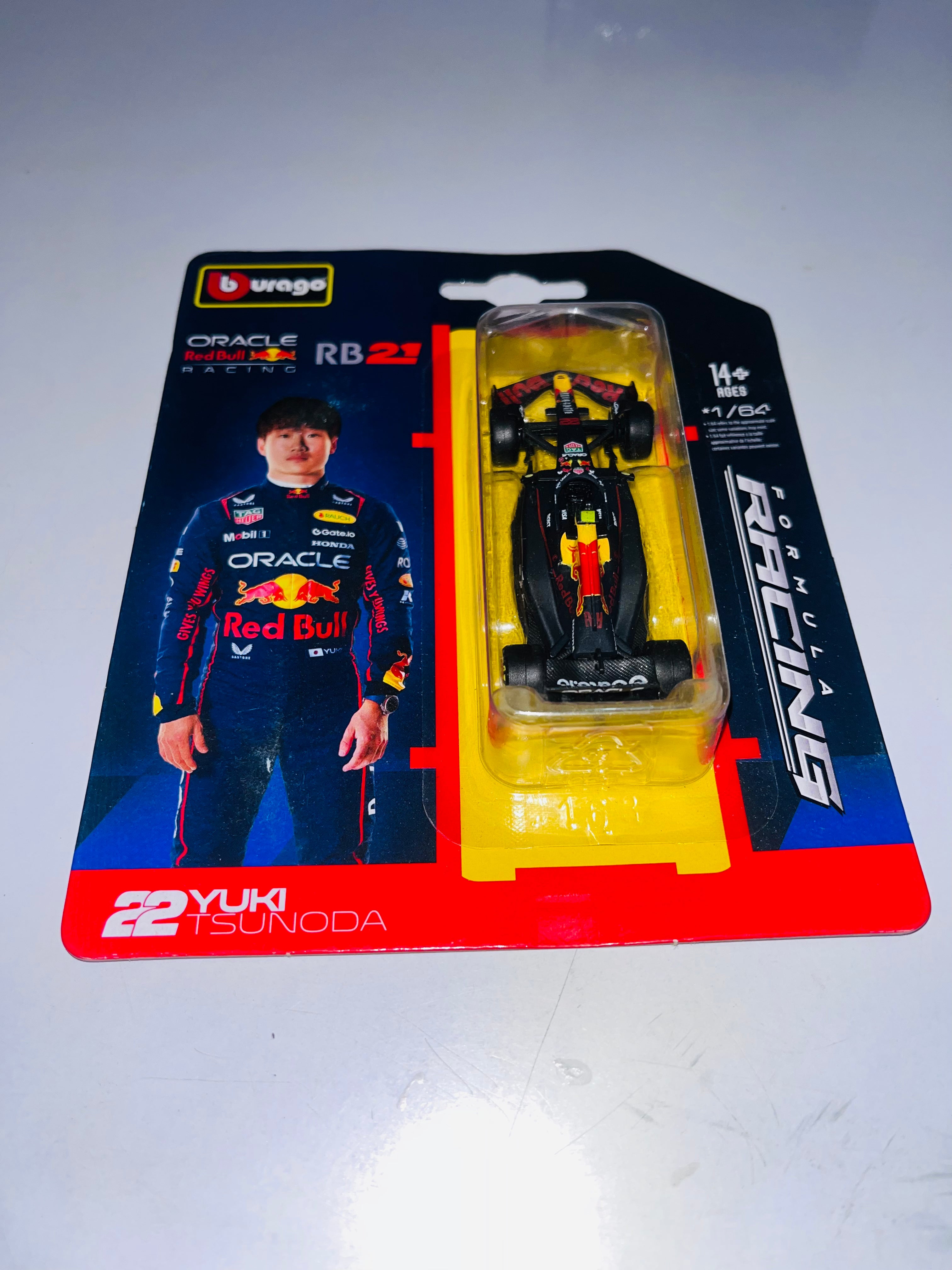 BBURAGO FORMULA RACING 1 : 64 DIECAST SCALE MODEL - ORACLE RED BULL RACING RB21 22 YUKI TSUNODA (blister pack)