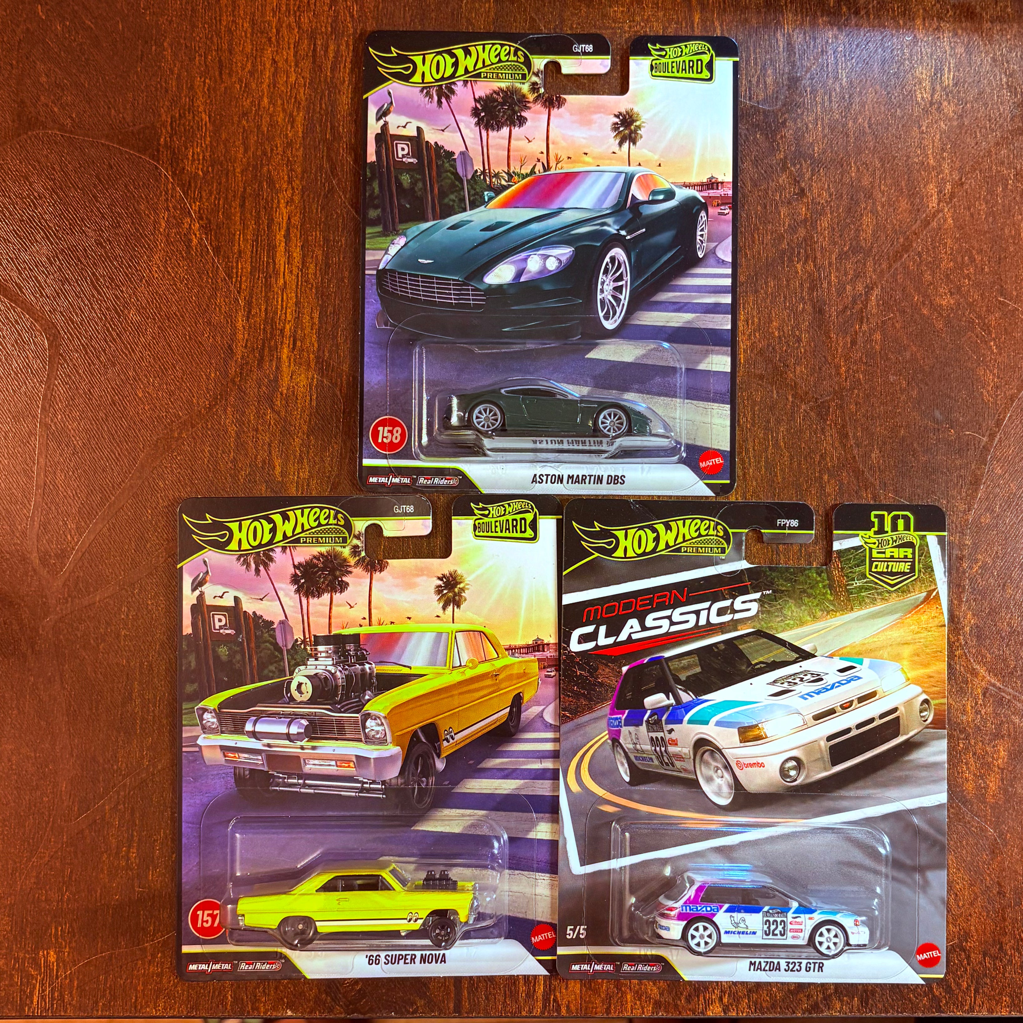 [Combo Set] Aston Martin DBS, ’66 Super Nova & Mazda 323 GTR - HotWheels Premium